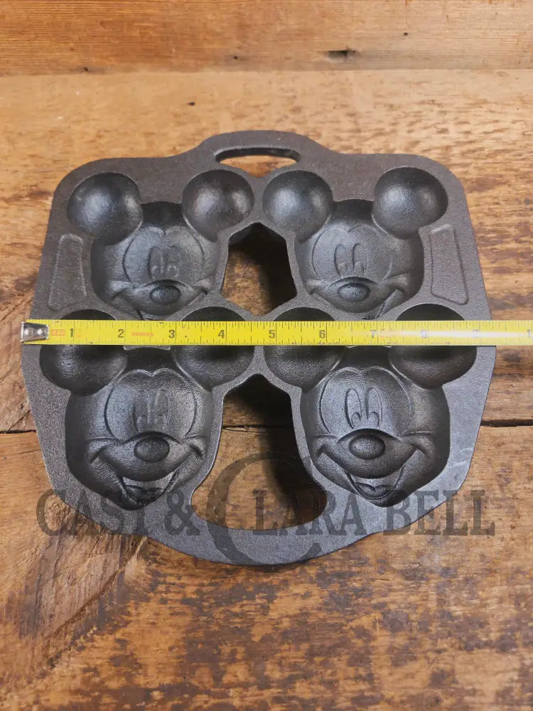 So cool! Lodge made Mickey Mouse Gem Pan. Makes great mini cakes! - Bakeware