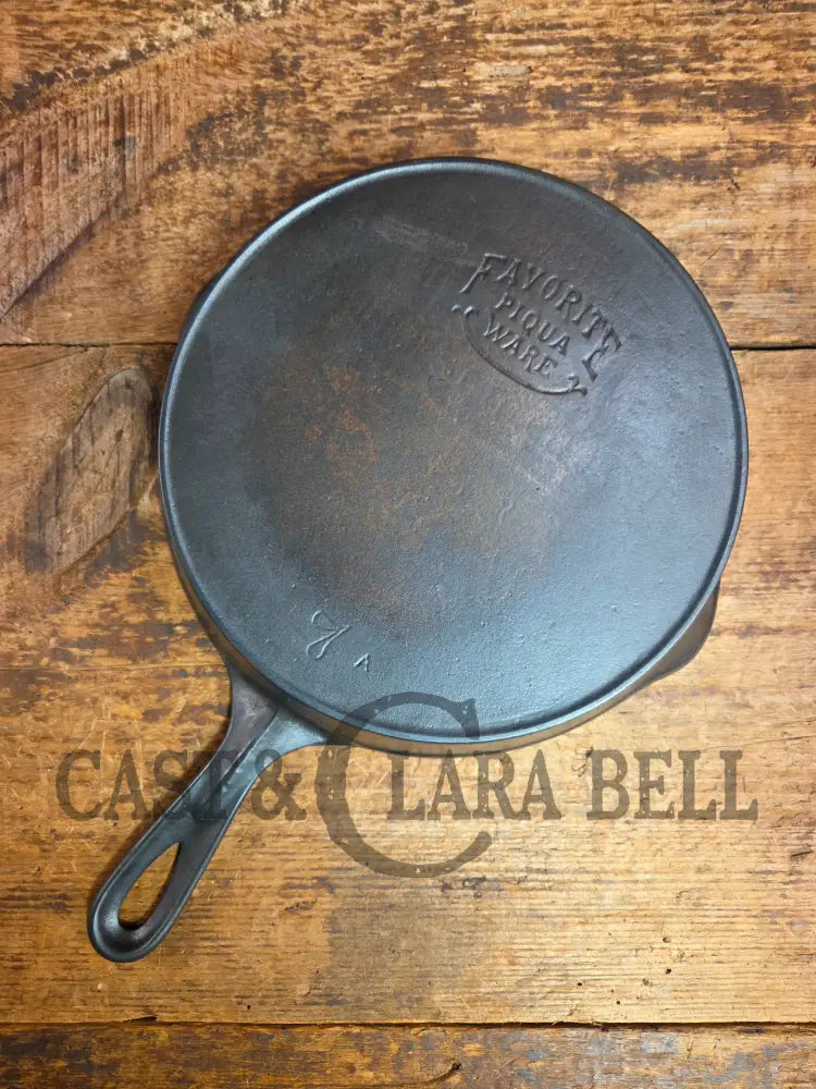 So unique! 1930βs Favorite Piqua Ware #7 Cast Iron Skillet Smiley Logo and Ghostmark CHF logo Skillet
