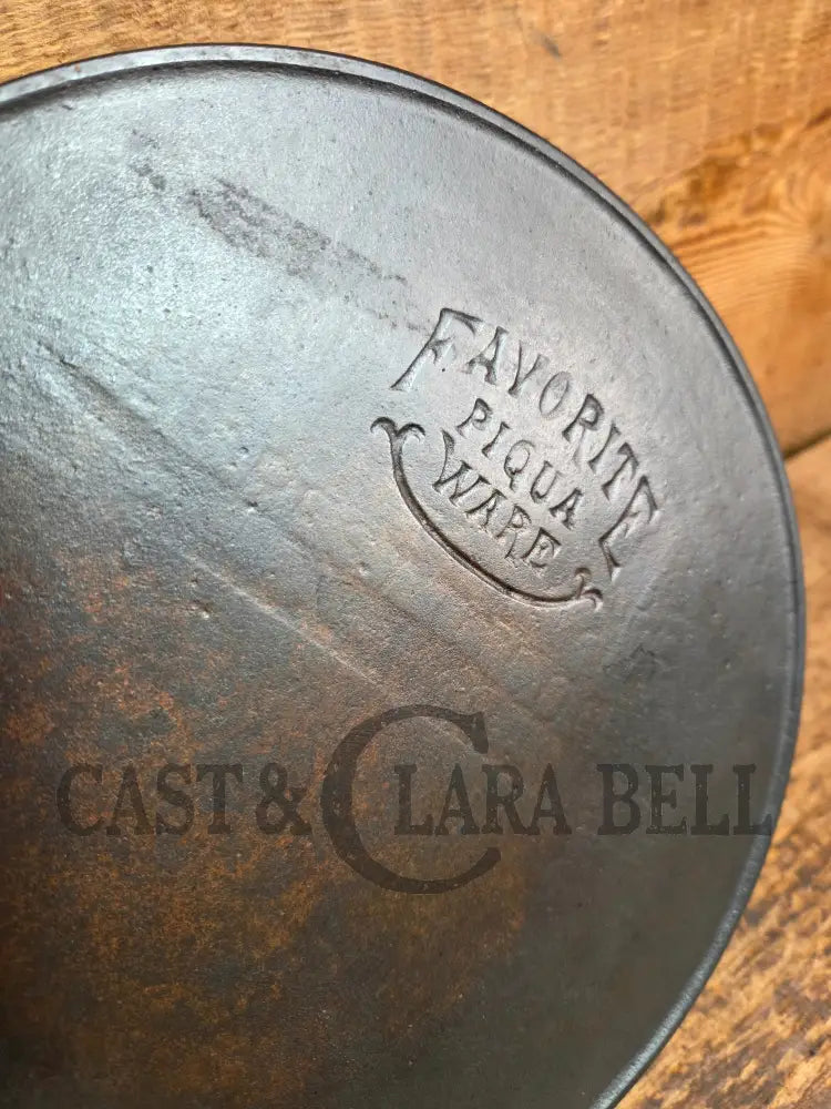 So unique! 1930βs Favorite Piqua Ware #7 Cast Iron Skillet Smiley Logo and Ghostmark CHF logo Skillet
