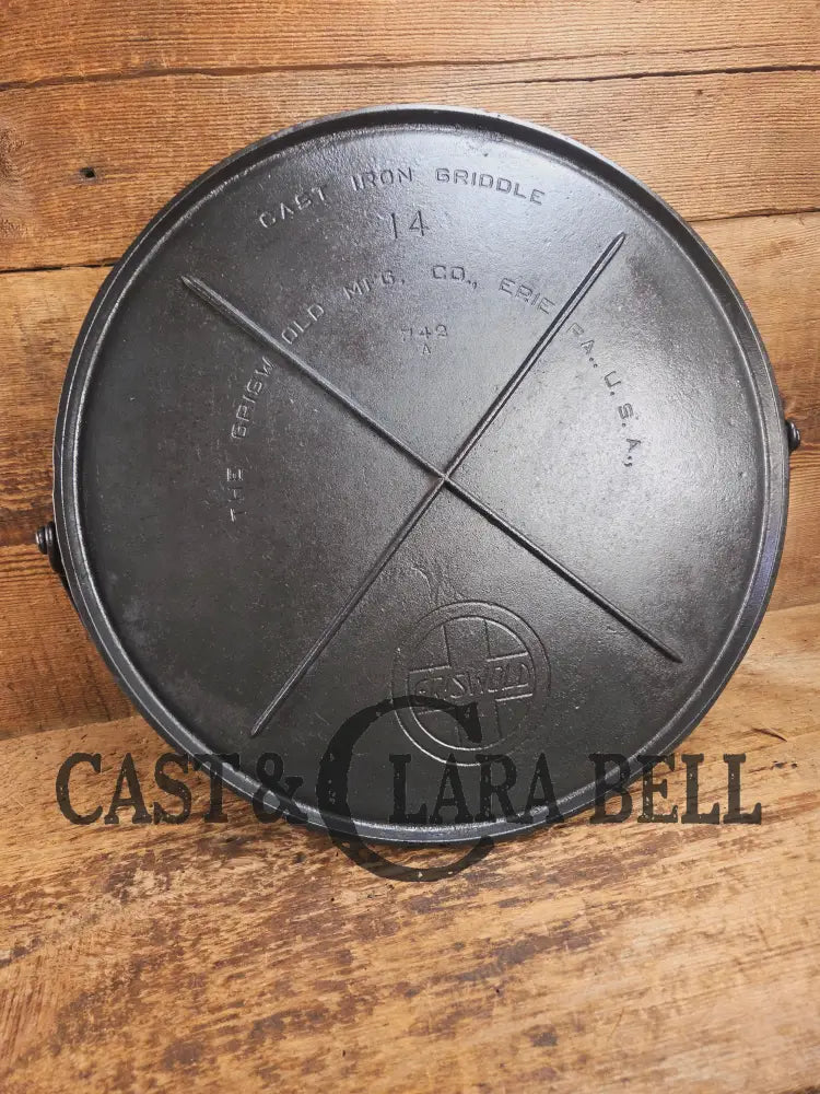 Spectacular piece! 1910โs #742 Griswold No. 14 Round Griddle w/ Bail and Slant Logo. The largest made of its kind and