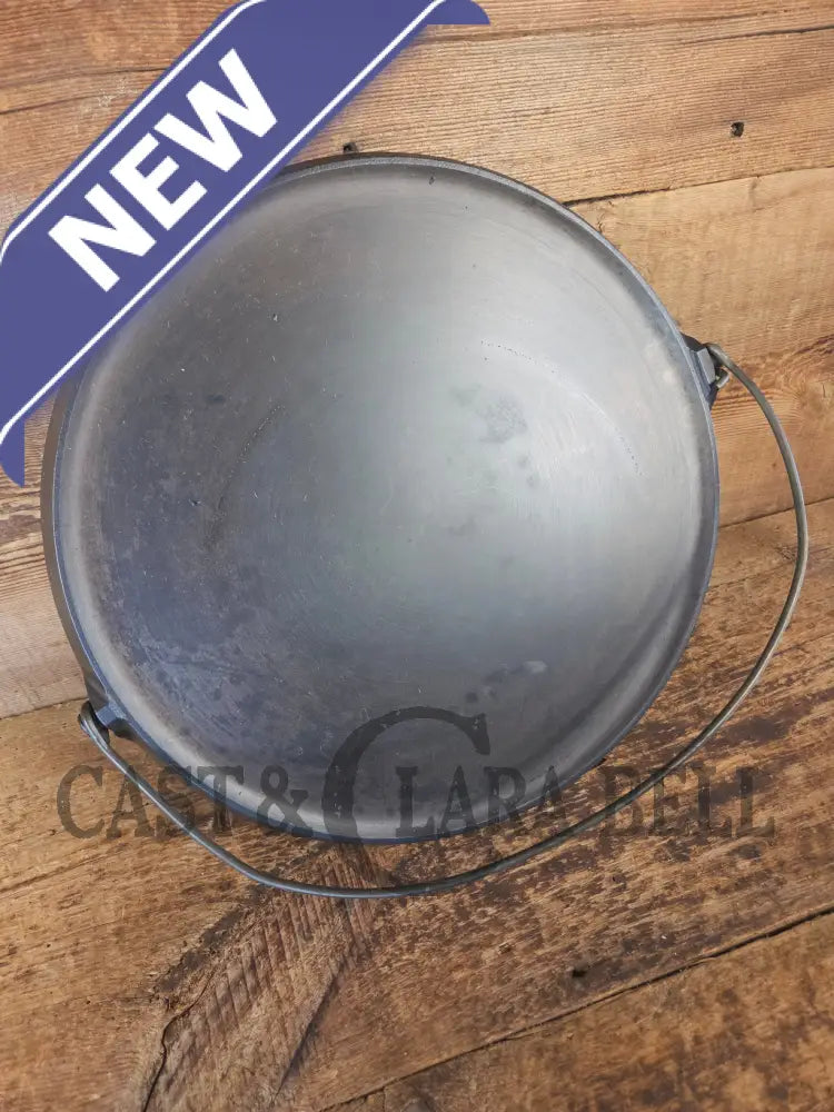 Spectacular piece! Late 1910’s #742 Griswold No. 14 Round Griddle w/ Bail and Slant Logo. The largest made of its kind