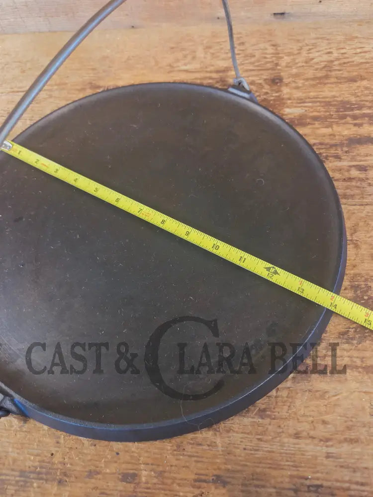 Spectacular piece! Late 1910’s #742 Griswold No. 14 Round Griddle w/ Bail and Slant Logo. The largest made of its kind