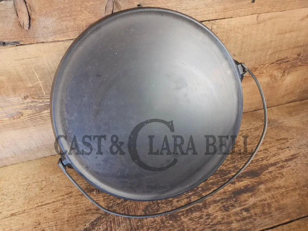 Spectacular piece! Late 1910’s #742 Griswold No. 14 Round Griddle w/ Bail and Slant Logo. The largest made of its kind