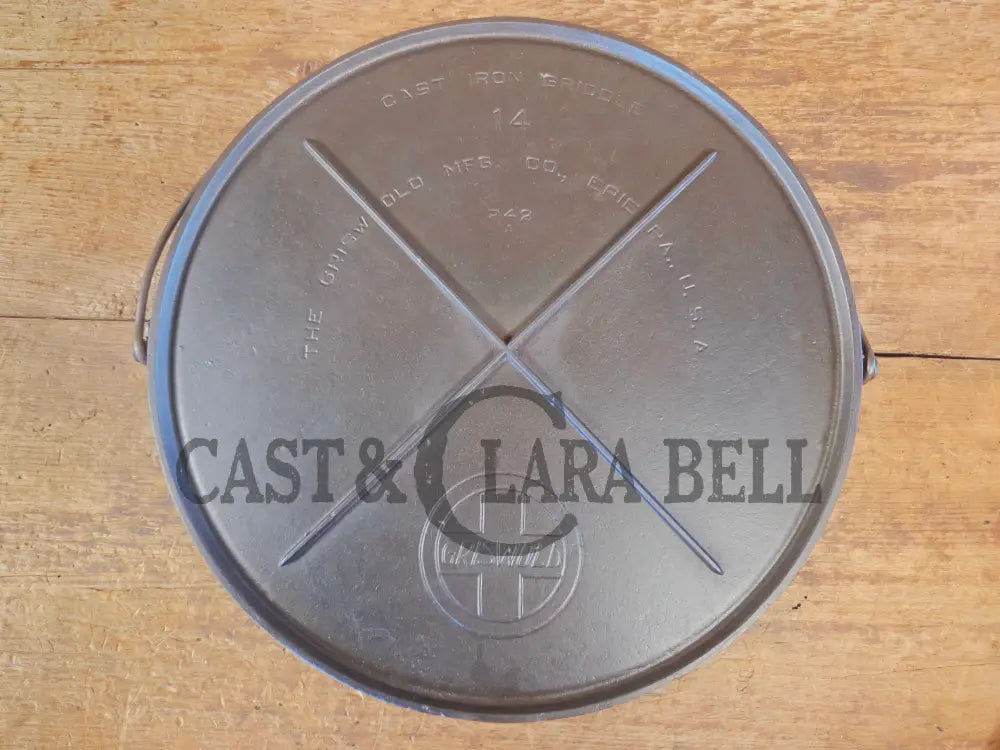 Spectacular piece! Late 1910’s #742 Griswold No. 14 Round Griddle w/ Bail and Slant Logo. The largest made of its kind