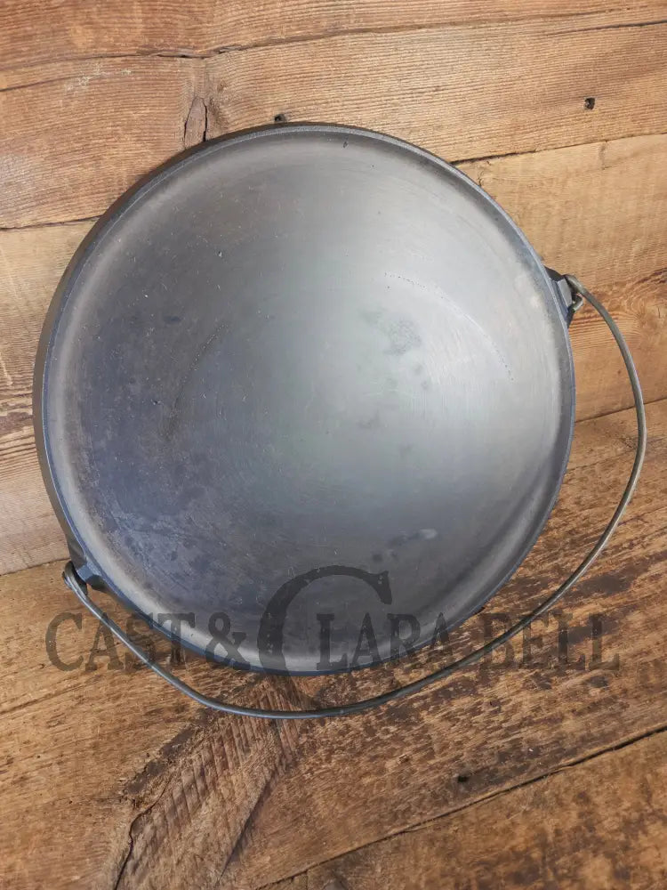 Spectacular piece! Late 1910’s #742 Griswold No. 14 Round Griddle w/ Bail and Slant Logo. The largest made of its kind