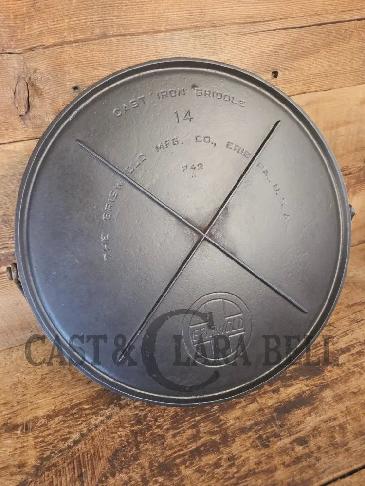 Spectacular piece! Late 1910’s #742 Griswold No. 14 Round Griddle w/ Bail and Slant Logo. The largest made of its kind