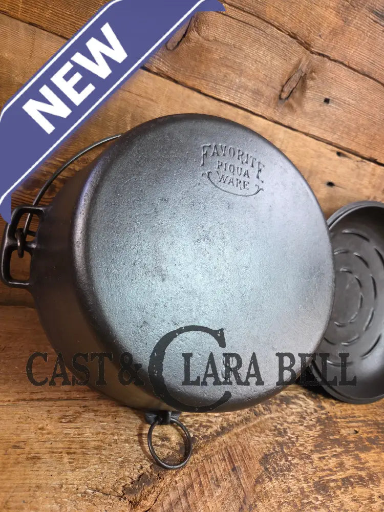 Stunning! 1930’s Favorite Piqua Ware #8 Dutch Oven with matching lid. Smiley Logo. Dutch Ovens Trivets & Kettles