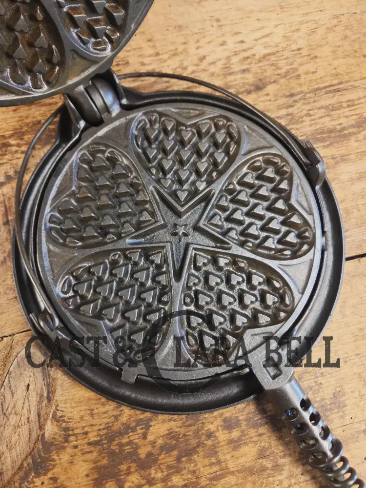 Stunning. The Premier waffle iron! Griswold No. 18 ’Heart and Star’ (919/920) Waffle Iron. Bailed Low Base. Makes the