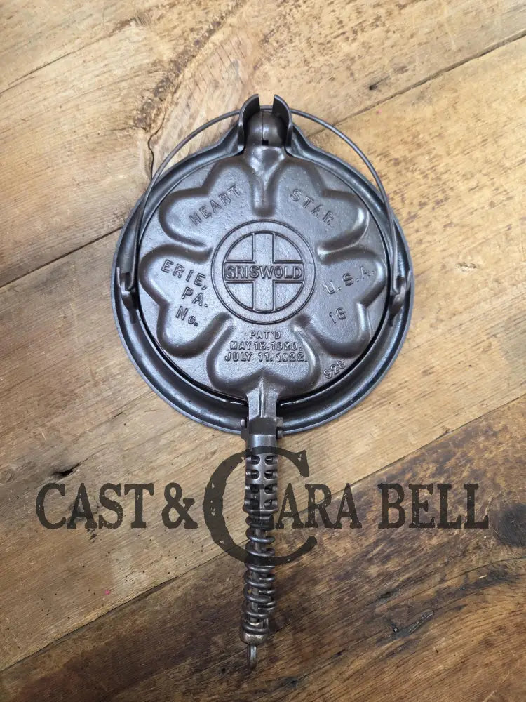 The Premier waffle iron! Griswold No. 18 ’Heart and Star’ (928/928) Waffle Iron (Large Star version). Bailed base.