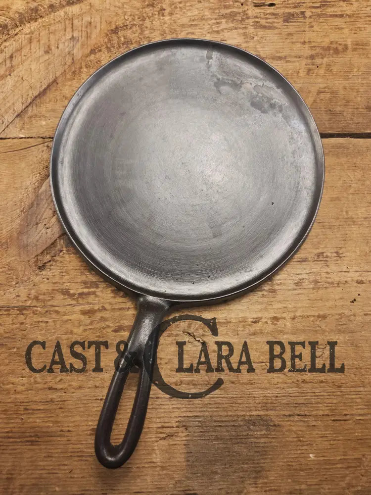 Tougher to find. 1920’s Favorite Piqua Ware #7 Round Cast Iron Griddle with Smiley Logo. Perfect grilled cheese and