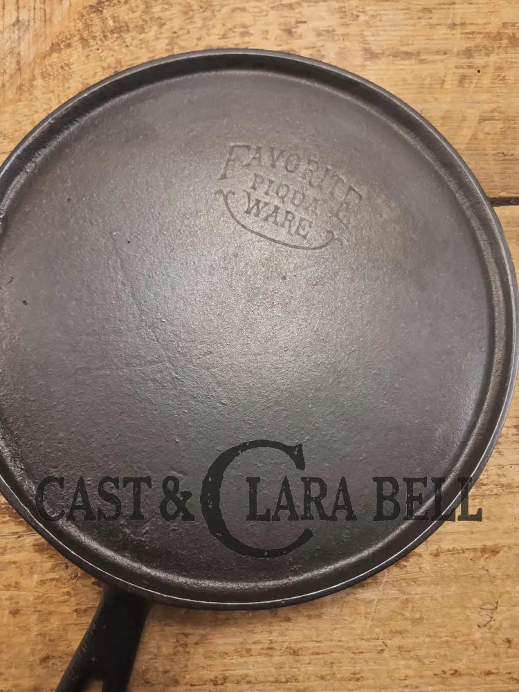 Tougher to find. 1920’s Favorite Piqua Ware #7 Round Cast Iron Griddle with Smiley Logo. Perfect grilled cheese and