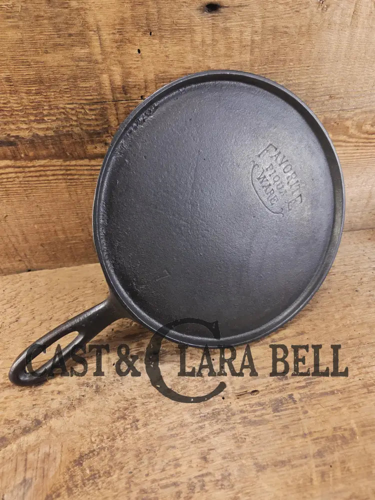 Tougher to find. 1920’s Favorite Piqua Ware #7 Round Cast Iron Griddle with Smiley Logo. Perfect grilled cheese and