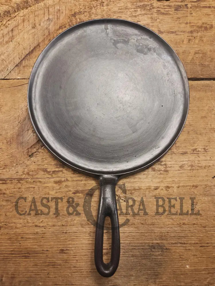 Tougher to find. 1920βs Favorite Piqua Ware #7 Round Cast Iron Griddle with Smiley Logo. Perfect grilled cheese and