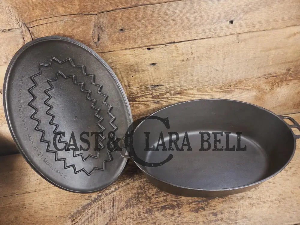 Turtle Top Style Wagner #5 Oval Roaster with Sawtooth drip lid and Stylized logo bottom Dutch Ovens Trivets & Kettles