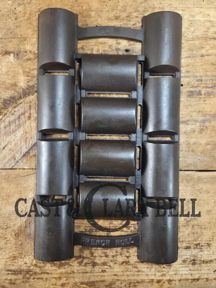 Unknown French Roll No. 11 Pan w/ raised No. 11 & French Roll markings. Rumored Griswold but likely Unknown Beautiful