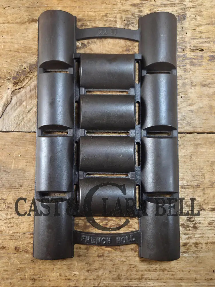 Unknown French Roll No. 11 Pan w/ raised No. 11 & French Roll markings. Rumored Griswold but likely Unknown Beautiful