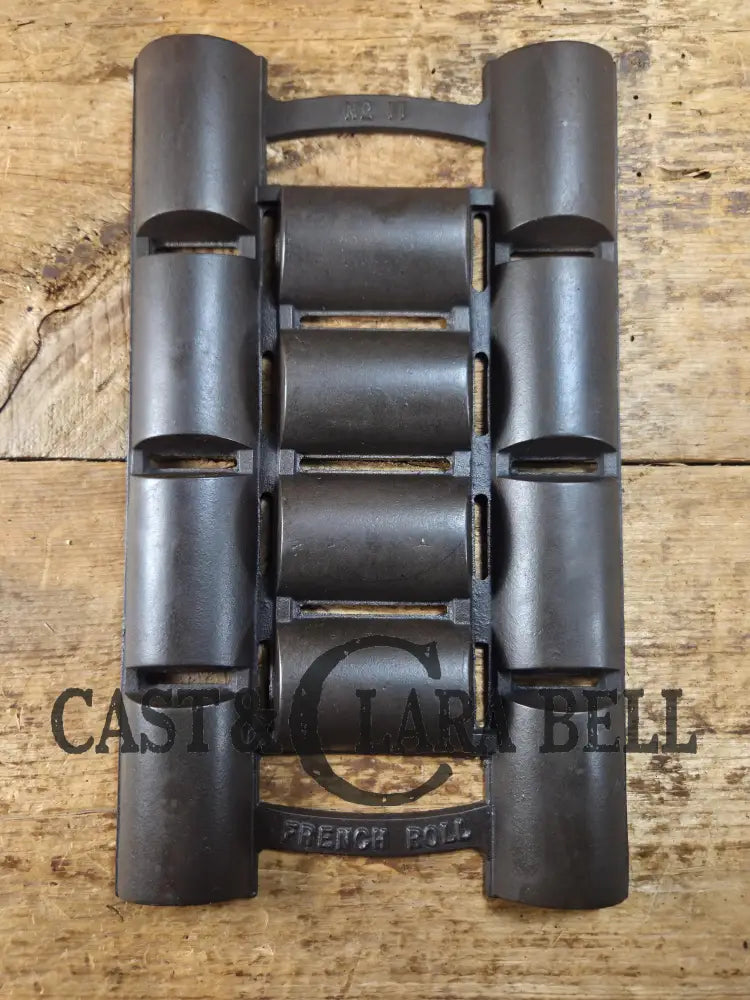 Unknown French Roll No. 11 Pan w/ raised No. 11 & French Roll markings. Rumored Griswold but likely Unknown Beautiful