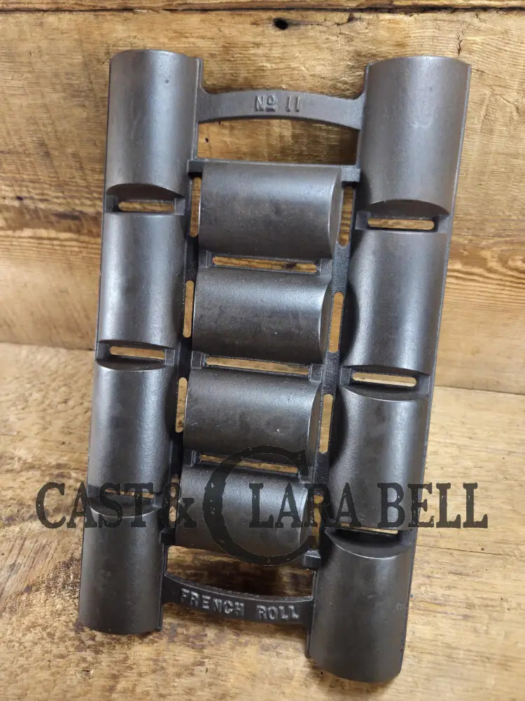 Unknown French Roll No. 11 Pan w/ raised No. 11 & French Roll markings. Rumored Griswold but likely Unknown Beautiful