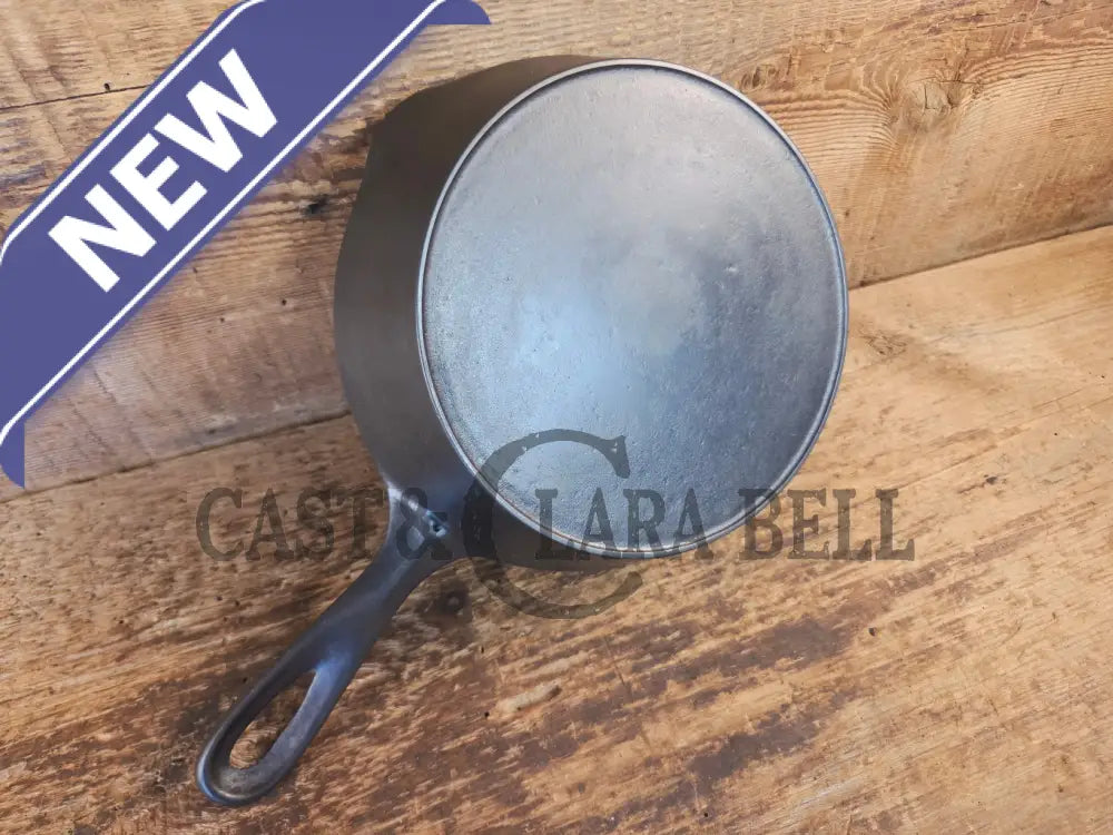Unmarked #5 Saute Skillet with Heat Ring. An Awesome sauce pan! Looks very similar to Wagner - Skillet