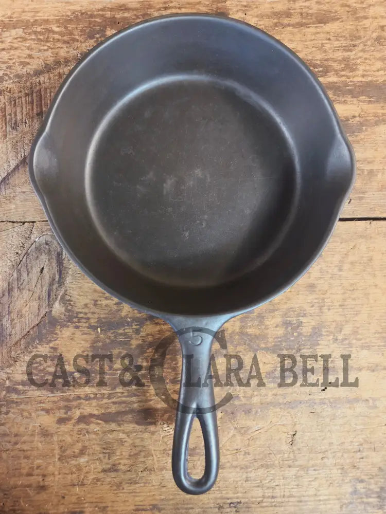 Unmarked #5 Saute Skillet with Heat Ring. An Awesome sauce pan! Looks very similar to Wagner - Skillet