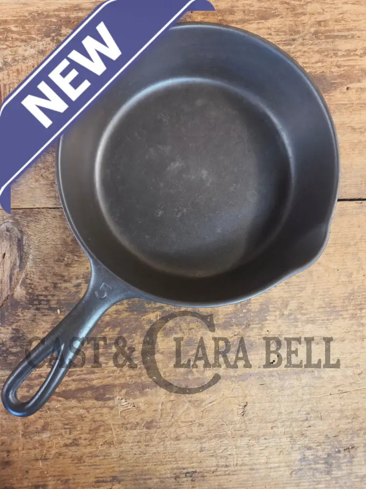 Unmarked #5 Saute Skillet with Heat Ring. An Awesome sauce pan! Looks very similar to Wagner - Skillet