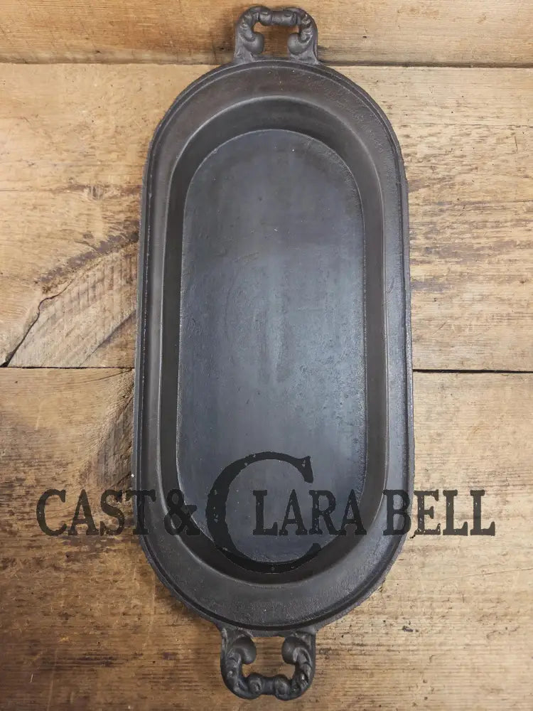 Very cool! Late 1800βs Antique Gate-marked #8 Cast Iron Griddle/Sad Iron Heater. Ornate fancy handles awesome for