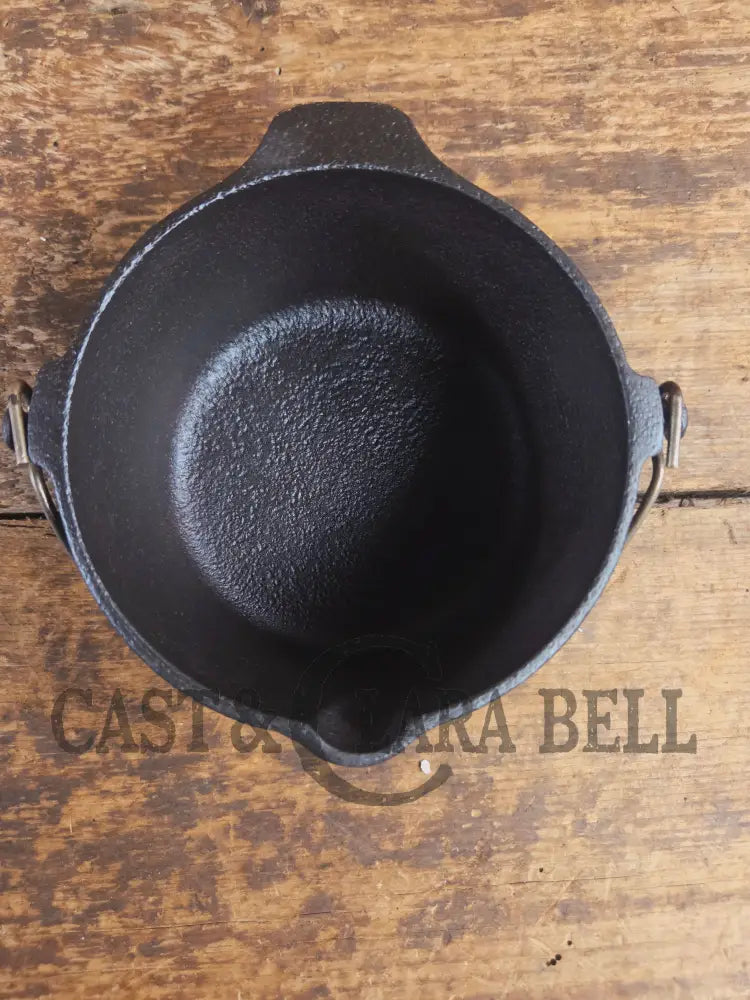 Very cool mini cast piece. 1940’s Griswold Cast Iron Patty Bowl with bailed handle. Great utility piece! - Dutch Ovens