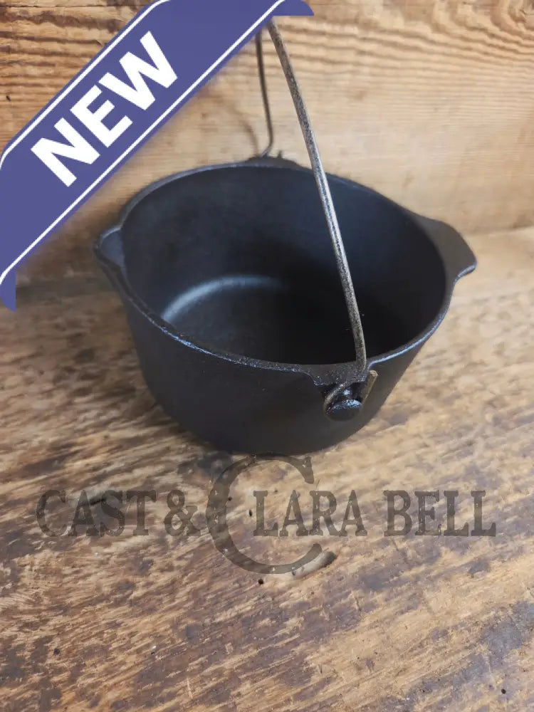 Very cool mini cast piece. 1940βs Griswold Cast Iron Patty Bowl with bailed handle. Great utility piece! - Dutch Ovens