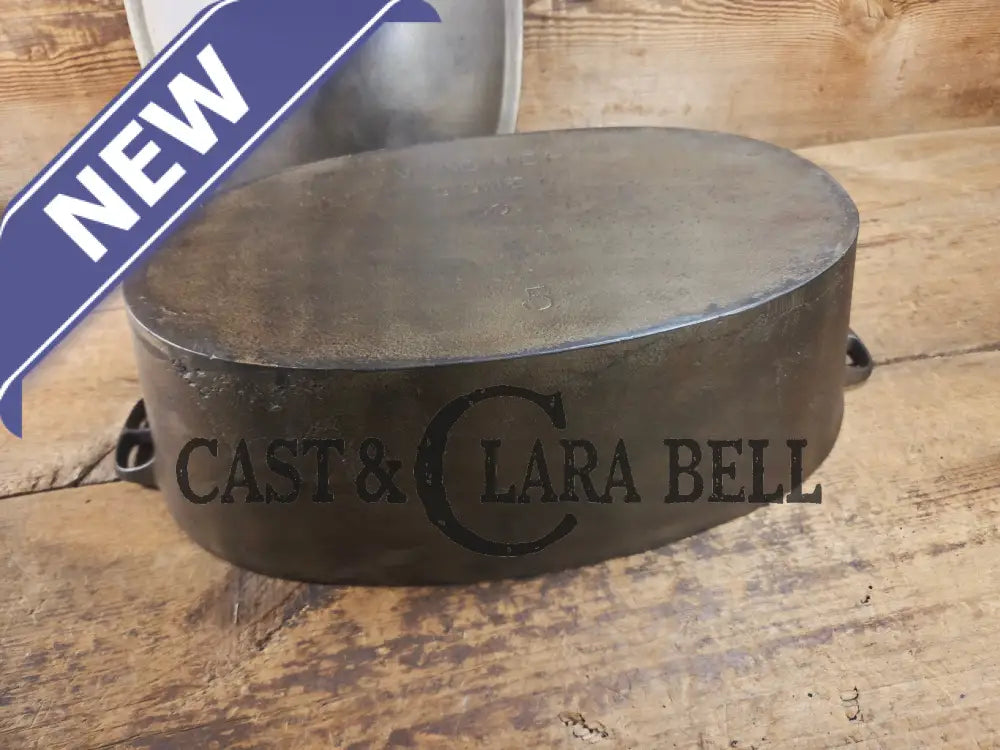 Very early Wagner #5 Nickle finish oval roaster. Beautiful patina on the outside and near perfect inside. Great bread