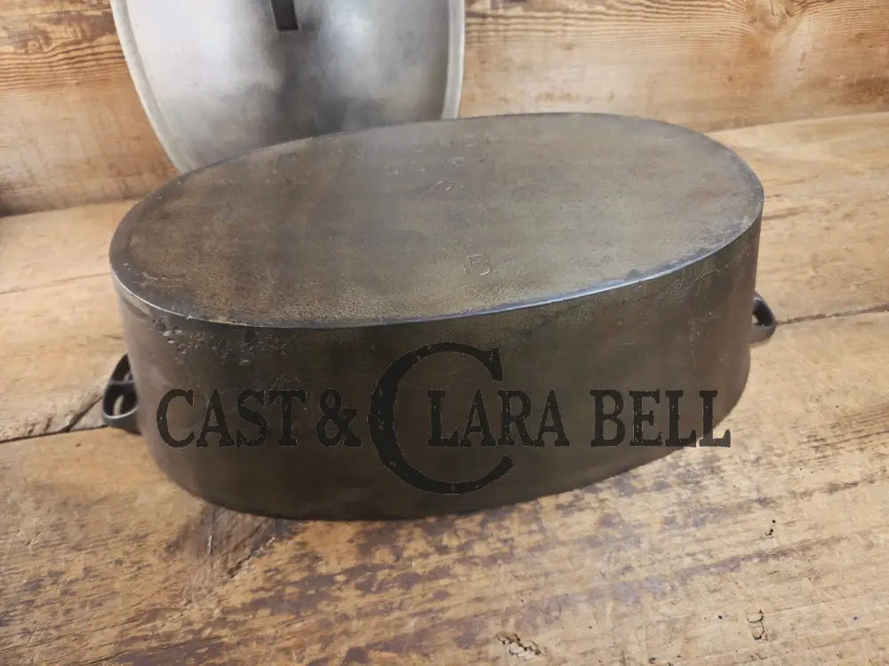 Very early Wagner #5 Nickle finish oval roaster. Beautiful patina on the outside and near perfect inside. Great bread