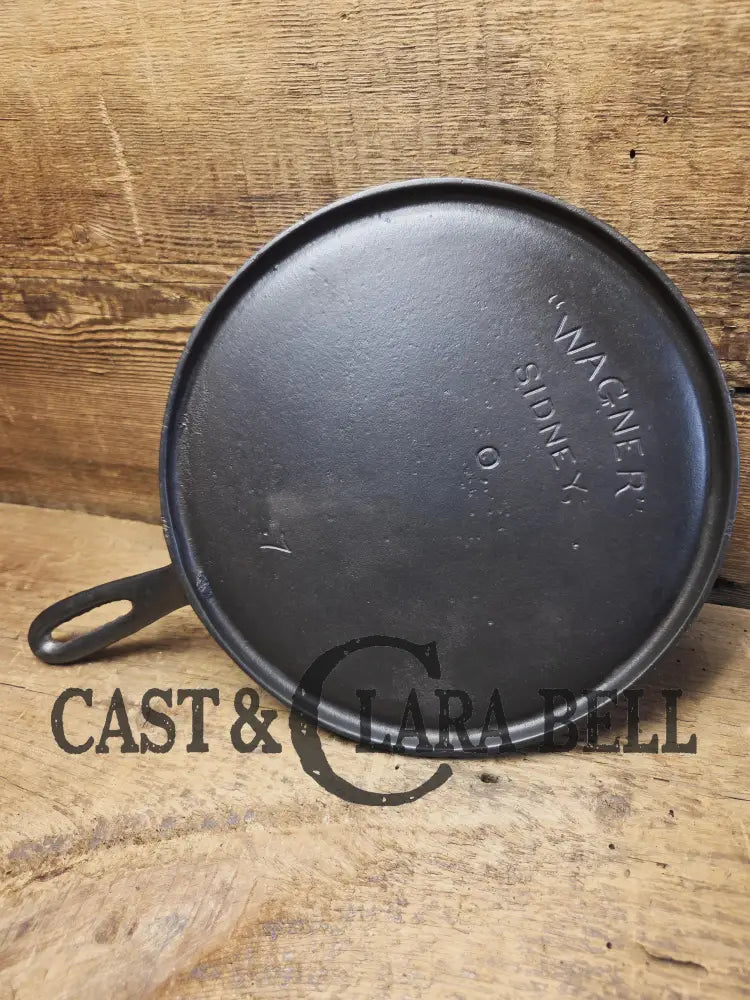 Very Hard to Find. Early 1900’s Wagner ’Arc’ Straight Logo #7 Griddle Skillet. Over 120 years old and in almost perfect