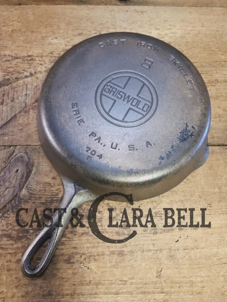 Very unique! 1930βs Griswold #8 Large Block Logo 704 B Cast Iron Skillet. Inside black iron outside nickel patina