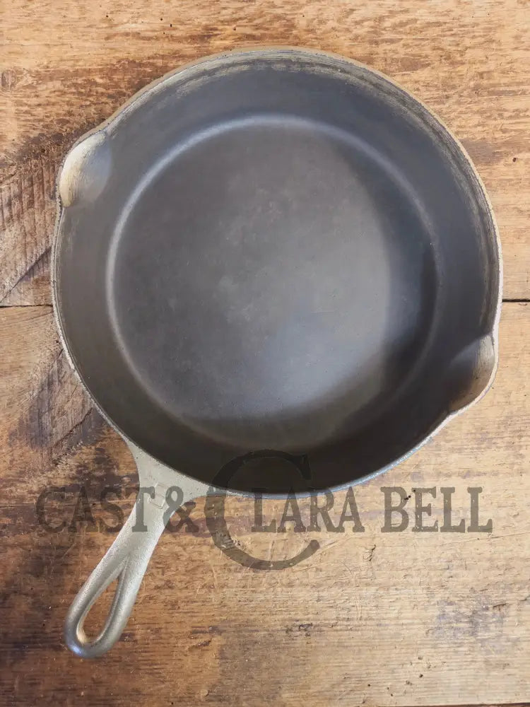 Very unique! 1930βs Griswold #8 Large Block Logo 704 R Cast Iron Skillet. Inside black iron outside nickel patina