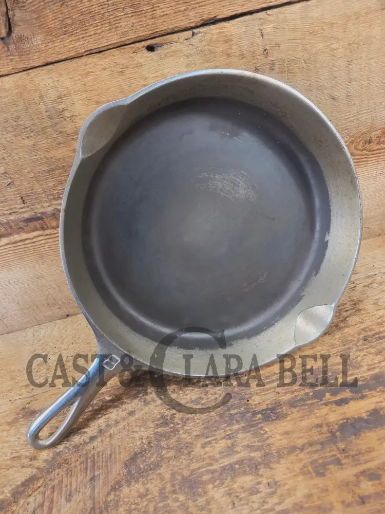Very unique! 1930βs Griswold #8 Large Block Logo 704 A Cast Iron Skillet. Inside black iron outside chrome patina