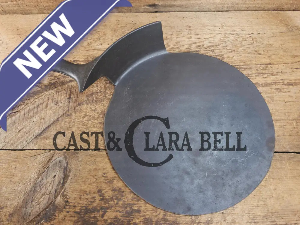 What a funky creation! Huge Repurposed Wagner #11 cast iron spatula. Possible pizza peel for your homemade pizzas!