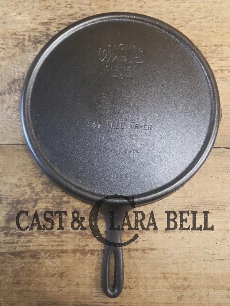 Wonderful utility griddle! Wagner Ware Fat Free Fryer skillet griddle with rim drain 1102 E. Perfect for pancakes or
