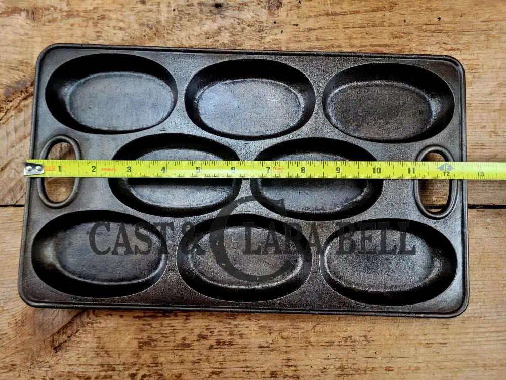 Wow! 1900βs Bridge Beach & Company #2 oval style gem pan. Priced to sell for small crack perfect for baking still after