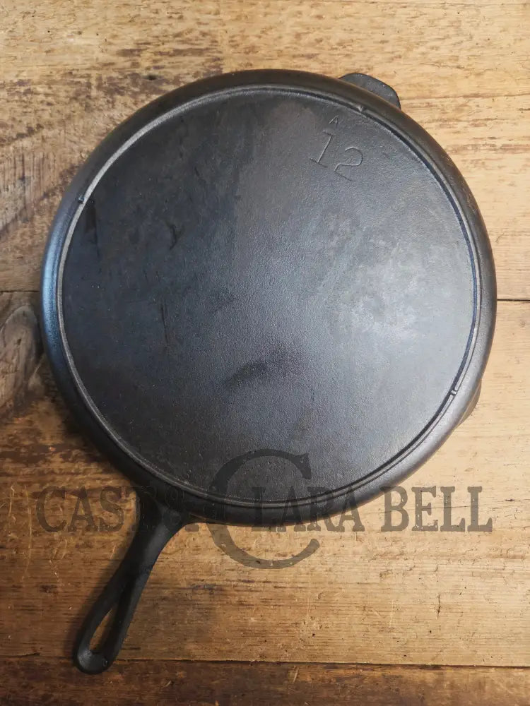 Wow. 1930-40’s era Lodge #12 Cast Iron Skillet with Three Notch Heat Ring. HUGE and perfect for large batch cooking