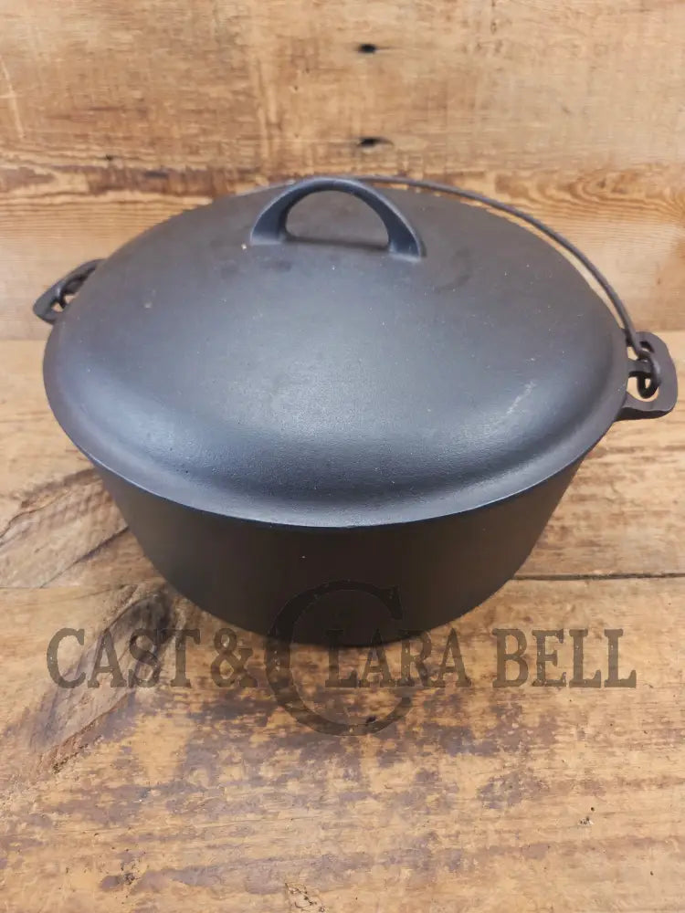 WOW. Not seen often! Griswold first series Slant Logo w/ ERIE Dutch oven Size #10 (835) Dutch Oven with ERIE Logo &