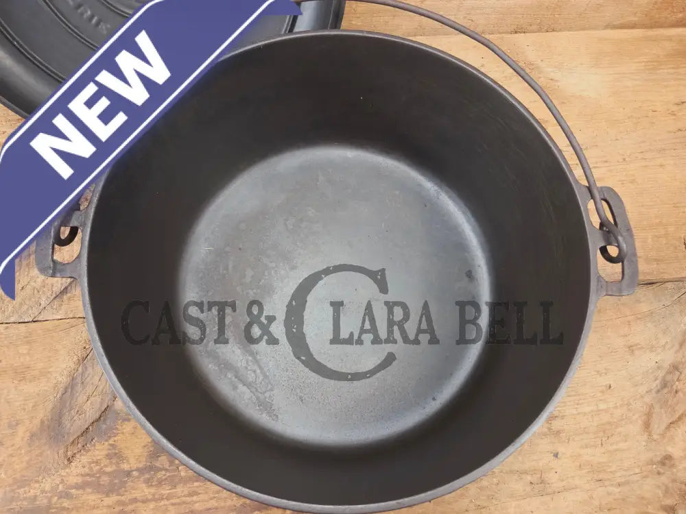 WOW. Not seen often! Griswold first series Slant Logo w/ ERIE Dutch oven Size #10 (835) Dutch Oven with ERIE Logo &