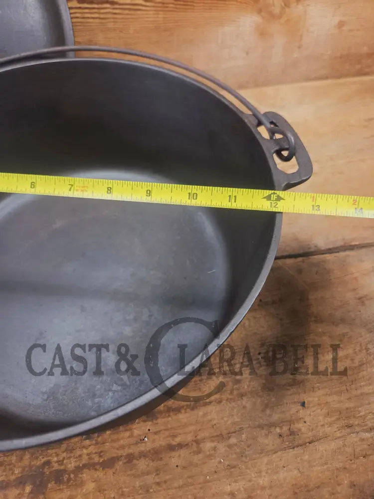 WOW. Not seen often! Griswold first series Slant Logo w/ ERIE Dutch oven Size #10 (835) Dutch Oven with ERIE Logo &