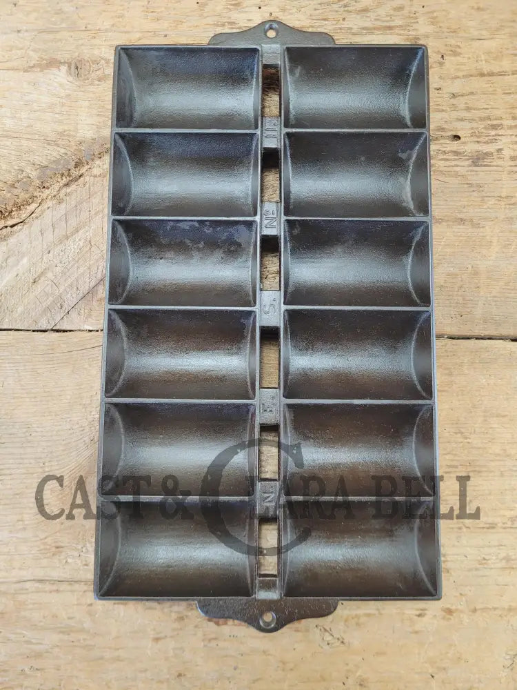 1900’s Griswold New England style (N.E.S embossed) ’French Roll’ Style cast iron bread pan