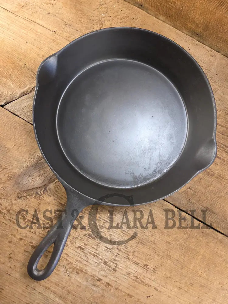 1920’s Favorite Piqua Ware #8 Cast Iron Skillet with Heat Ring and Smiley Logo 8B. SC24 Skillet
