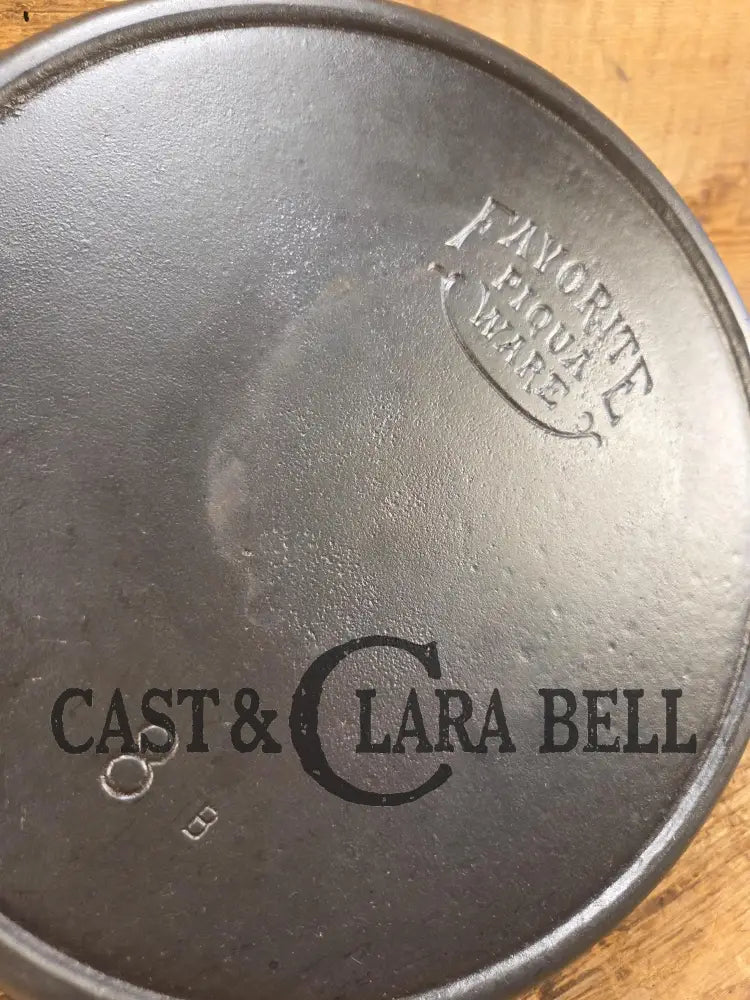 1920’s Favorite Piqua Ware #8 Cast Iron Skillet with Heat Ring and Smiley Logo 8B. SC24 Skillet