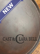 1920’s Favorite Piqua Ware #9 Round Cast Iron Griddle with Smiley Logo and Ghost mark block logo. Griddle