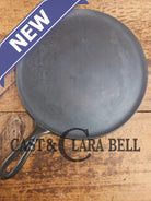 1920’s Favorite Piqua Ware #9 Round Cast Iron Griddle with Smiley Logo and Ghost mark block logo. Griddle