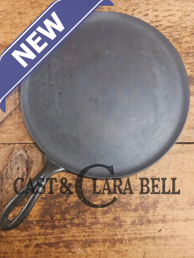 1920’s Favorite Piqua Ware #9 Round Cast Iron Griddle with Smiley Logo and Ghost mark block logo. Griddle