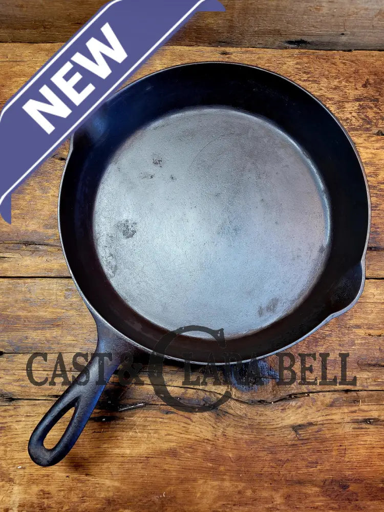 1920’S Favorite Piqua Ware No. 9 A Cast Iron Skillet With Heat Ring And ’Smiley’ Logo.