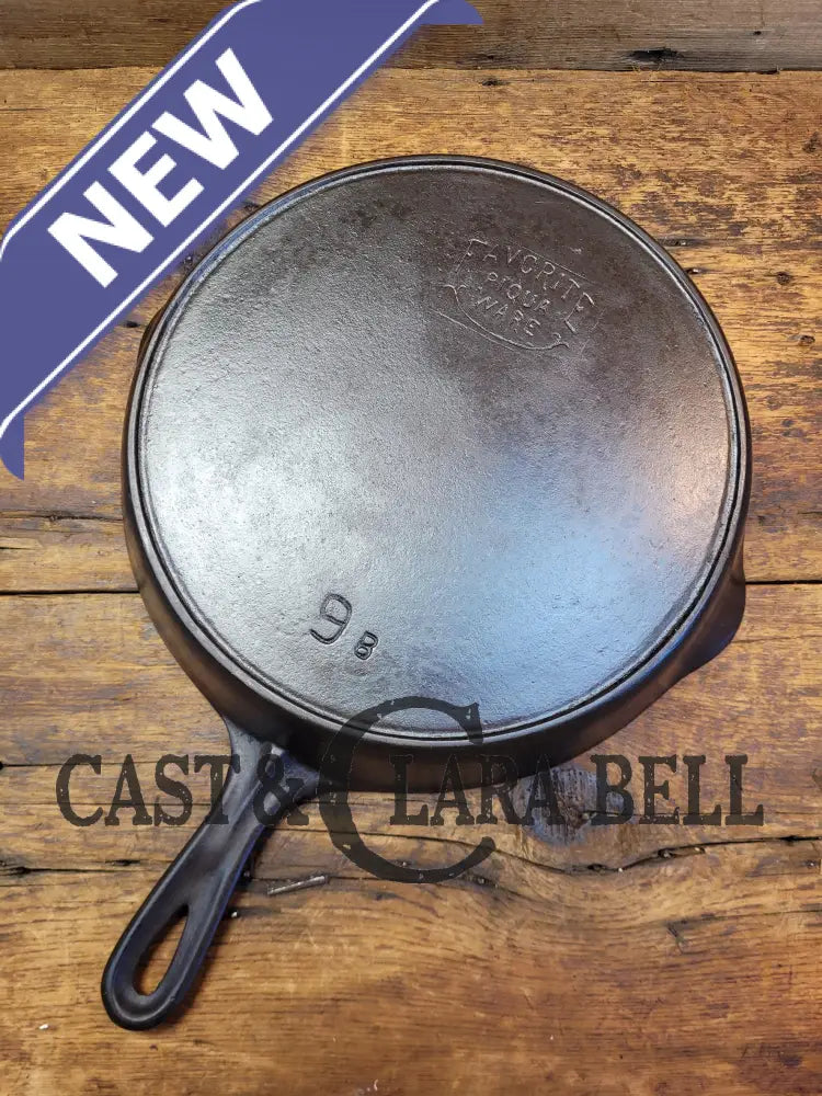 1920’S Favorite Piqua Ware No. 9 A Cast Iron Skillet With Heat Ring And ’Smiley’ Logo.