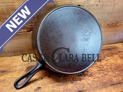 1920’S Favorite Piqua Ware No. 9 A Cast Iron Skillet With Heat Ring And ’Smiley’ Logo.